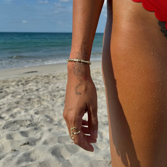 Pulsera ajustable tipo hueso