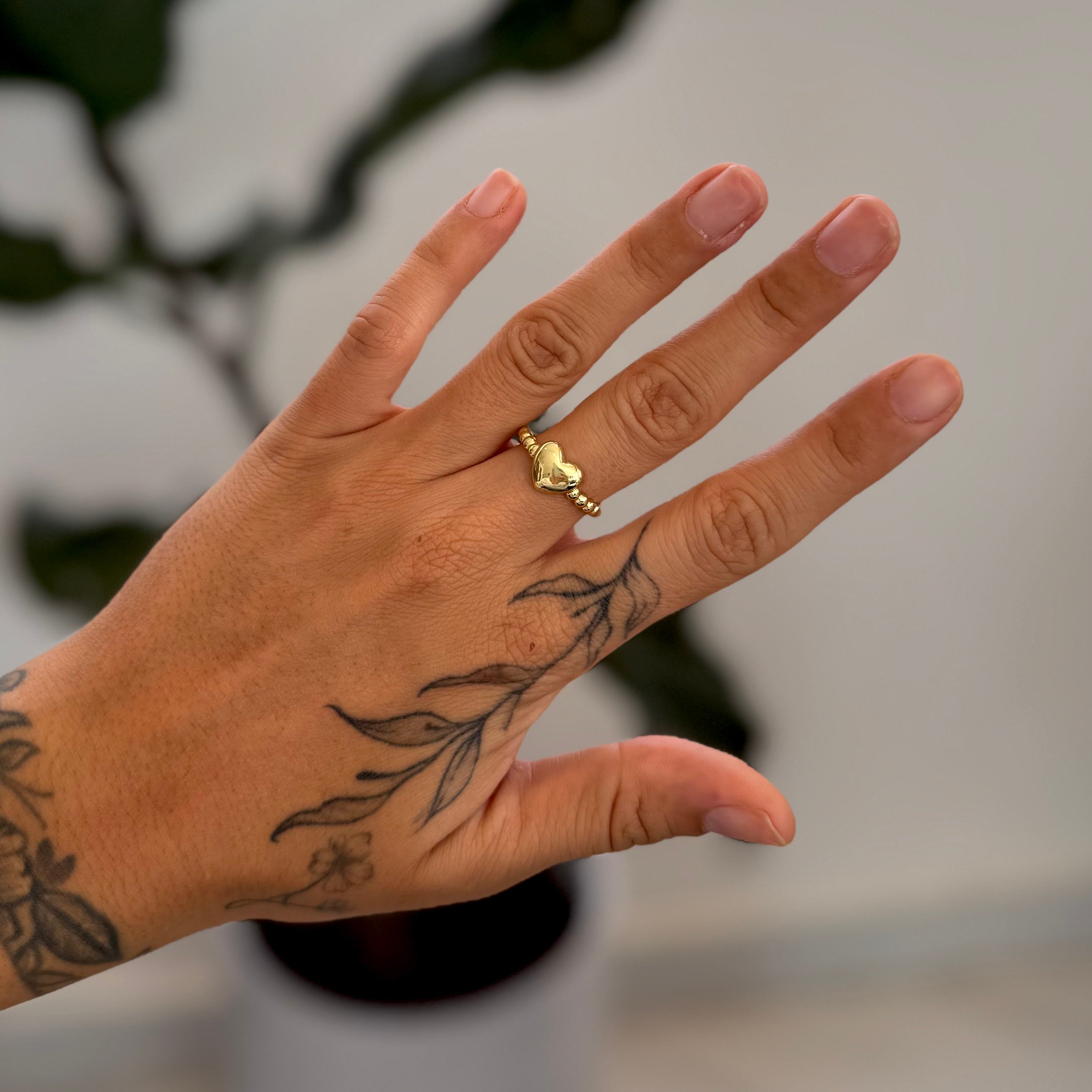 Anillo ajustable de corazon con bolitas