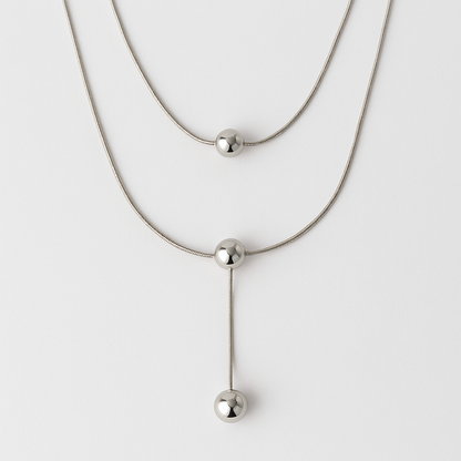 Collar doble plateado con cuentas redondas lisas