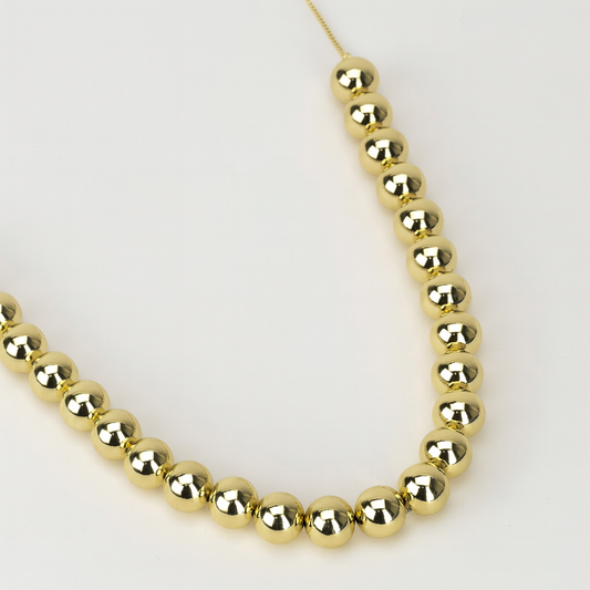 Collar ajustable con diseño de bolitas