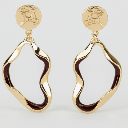 Aretes ondulados dorados