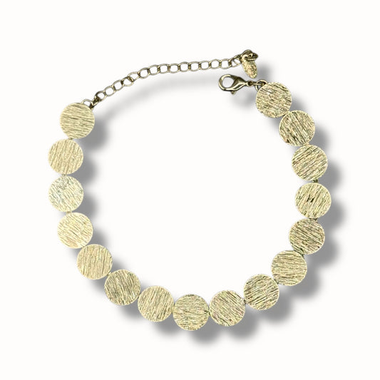 Pulsera de círculos texturizados