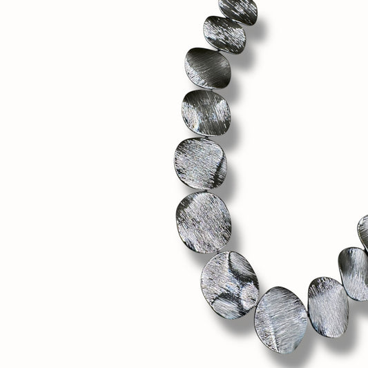 Pulsera de círculos texturizados