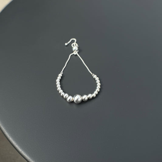 Pulsera ajustable de esferas