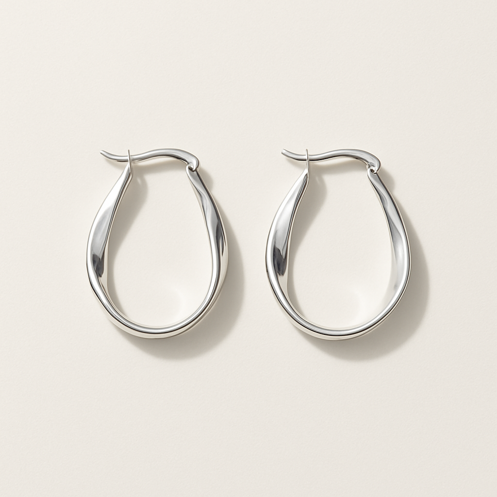 Arracadas alargadas torcidas con acabado martillado